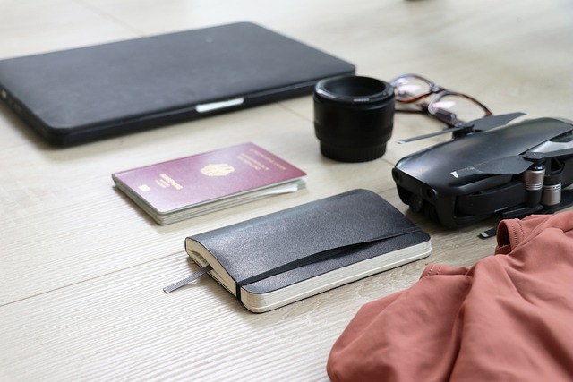 Passport, wallet and adapter ready for travel